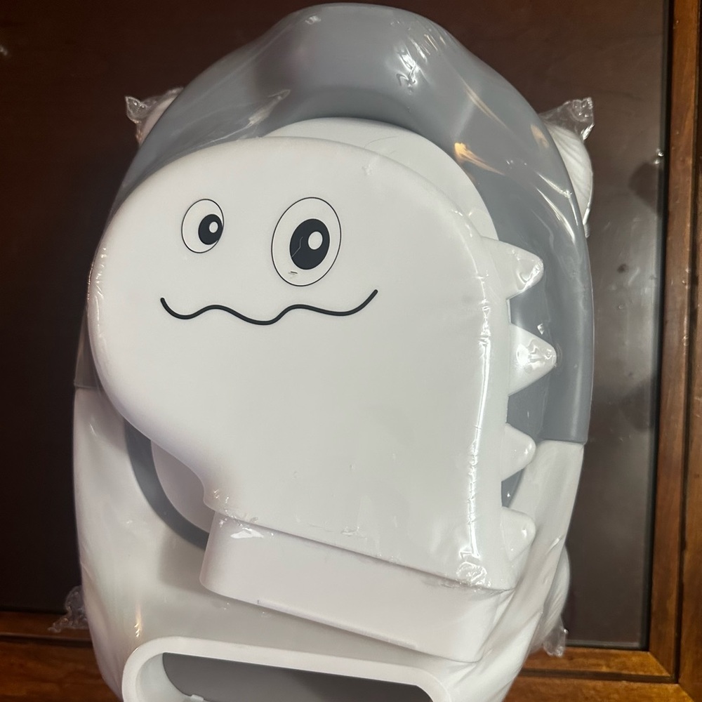Cute White and Gray Dinosaur Potty
